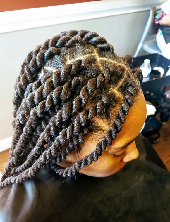 close up of braids by Ramas Hair Braiding