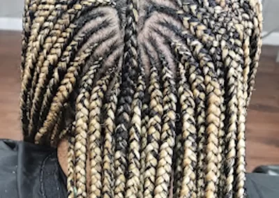 tribal braids on blond woman at Ramas Hair Braiding in Indianapolis, IN
