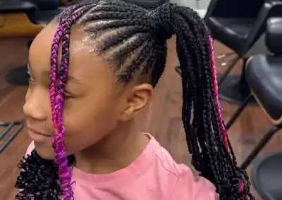 young girl with cornrows and pink money pieces