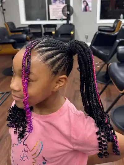 young girl with cornrows and pink money pieces